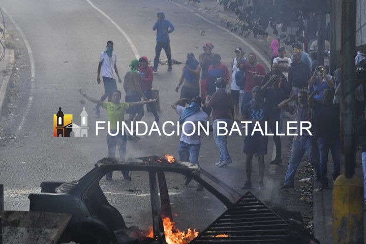 Las protestas en el barrio de San José de Cotiza. (AFP)